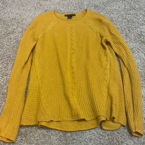 yellow knitted long sleeve sweater
